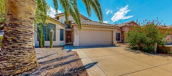 Updated home with private pool, enclosed yard, covered patio, grill, & W/D