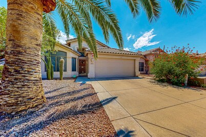Updated home with private pool, enclosed yard, covered patio, grill, & W/D