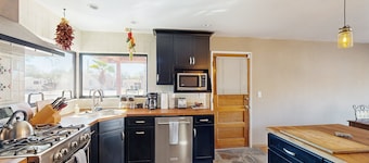 Sun-soaked & charming dog-friendly retreat with private pool, large patio, & W/D