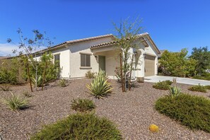 Exterior - Airy desert home with an enclosed yard, private pool, hot tub, firepit, & W/D (Buckeye)