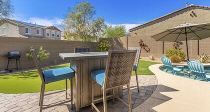 Airy desert home with an enclosed yard, private pool, hot tub, firepit, & W/D