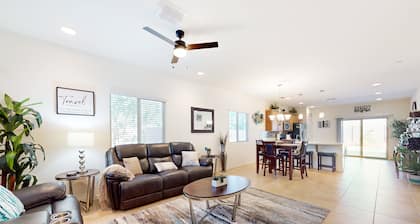 Airy desert home with an enclosed yard, private pool, hot tub, firepit, & W/D