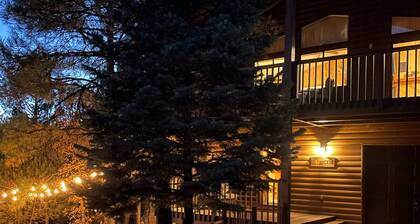 Serene, two-story cabin with a game room, washer/dryer, & furnished deck