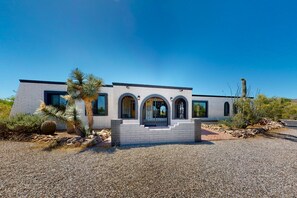Exterior - Dog-friendly home with lovely desert views, fenced yard, patio & fireplace (Tucson)