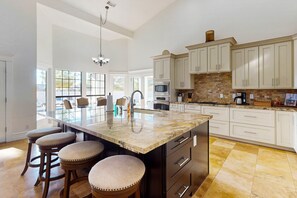Fridge, microwave, oven, stovetop - Family-friendly luxury home in Estate Groves with private pool & cabana + WiFi (Mesa)