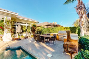 Outdoor dining - Pristine home w/ a wet bar, outdoor kitchen, private pool, & spa (Rancho Mirage)