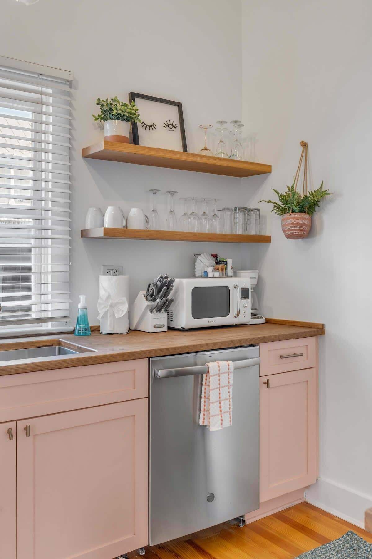 Fridge, stovetop, dishwasher, coffee/tea maker