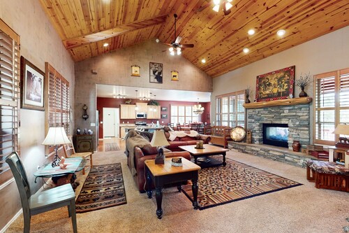 Spacious home with fireplace, multiple patios, balcony & grill