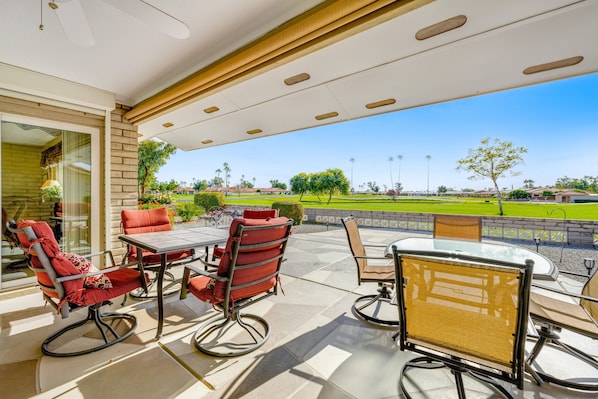 Outdoor dining - Dog-friendly, golf course adjacent home with a pool, hot tub, & fitness center (Mesa)