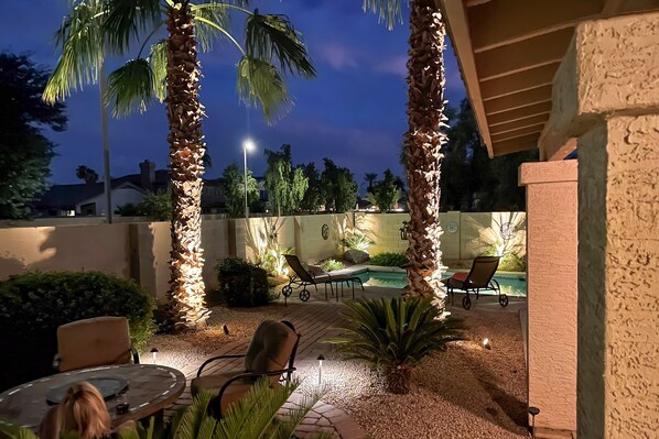 Outdoor dining - Dog-friendly home with pool, firepit, fast WiFi, central AC, & washer/dryer (Goodyear)