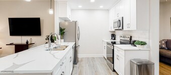 Chic dog-friendly condo with pool, central AC, washer/dryer, & grill