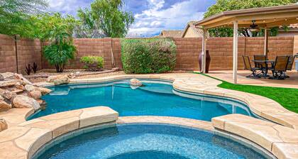 Desert charmer with enclosed yard, heated pool, smart TVs, W/D, & full kitchen