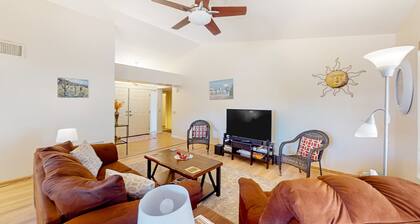 Mountain-view home with shaded patio, large yard, on-site golf & tennis