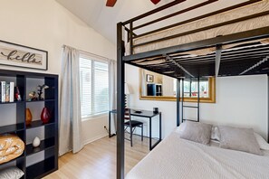 A bunk bed room with a desk, a bookshelf, and a window with curtains. - Scottsdale Oasis – Poolside Paradise Near Golf, Shopping & Freeways! (Scottsdale)