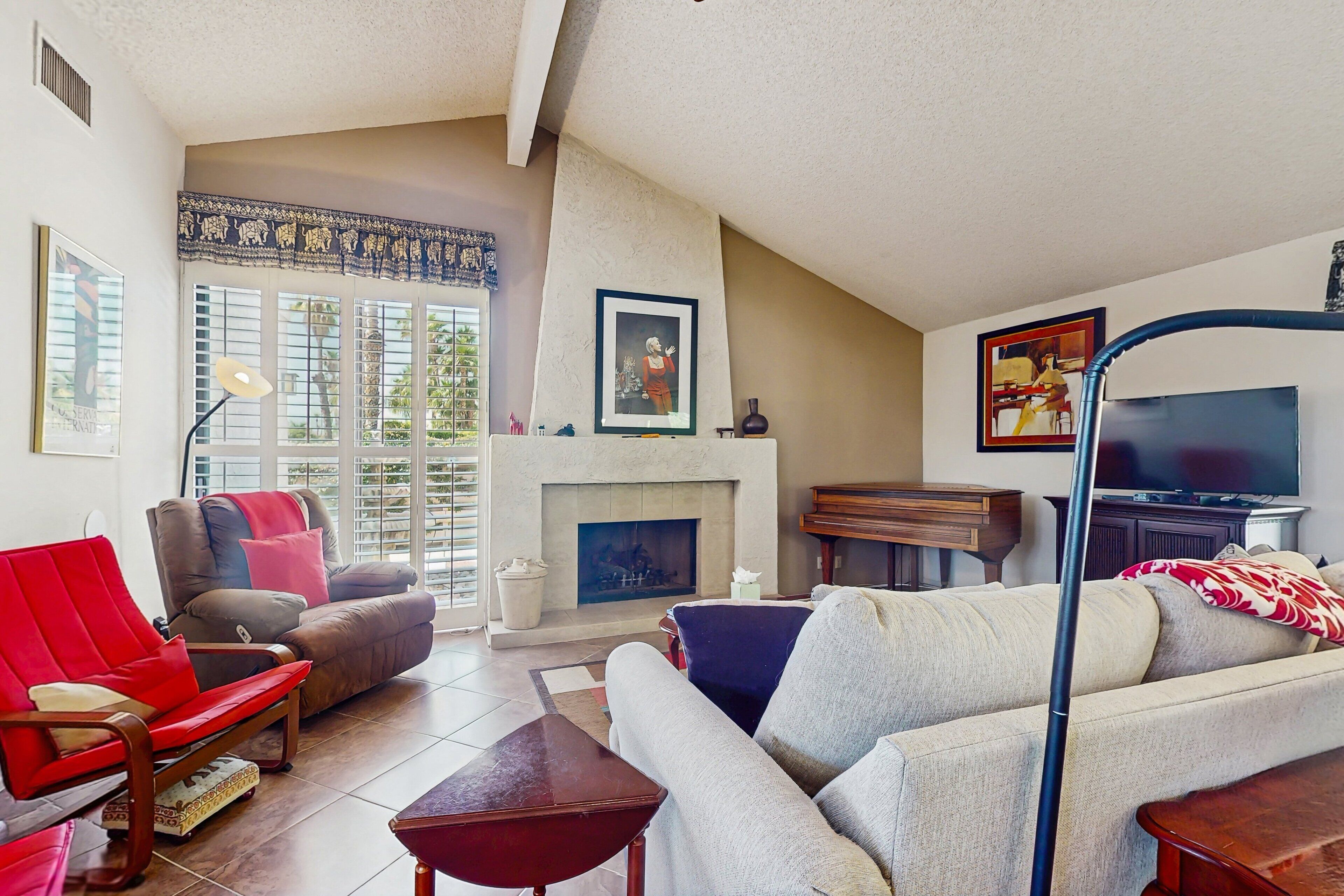 Smart TV, fireplace, books