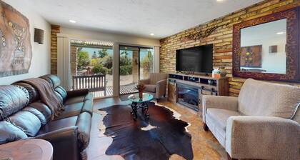 Ground-floor condo with on-site pool, grills, patio, & central AC