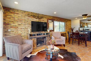 Smart TV, fireplace, books