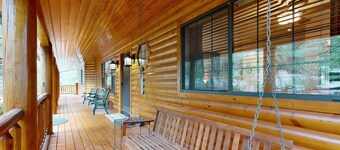 Two-story home with game room, large deck, bbq grill, & yard