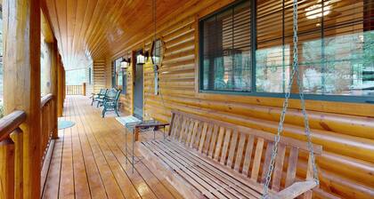 Two-story home with game room, large deck, bbq grill, & yard