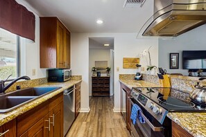 Fridge, microwave, oven, stovetop - Ground-floor, golf-adjacent getaway w/ free WiFi, central A/C, & 20 shared pools (Palm Desert)