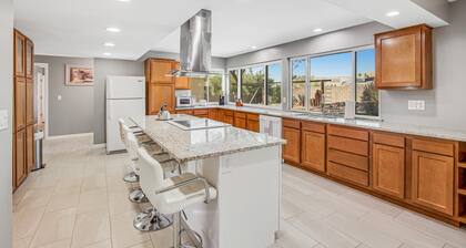 Dog-friendly sunshine stay with private pool, spacious yard, central AC & W/D