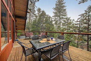 Outdoor dining - Beautiful, dog-friendly cabin with large decks, forest views, jetted tub, & more (Idyllwild)