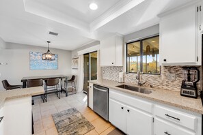 Fridge, microwave, oven, stovetop - Remodeled dog friendly ranch with hot tub, fire pit, mountain views, WiFi, & AC (Twentynine Palms)