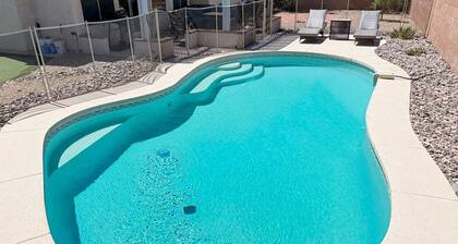 Sun-filled dog-friendly home with private pool, putting green, & mountain views