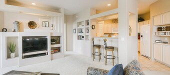 Mountain-view condo with incredible sunset views, pool, hot tub & grill