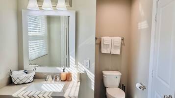 Hair dryer, towels, soap, toilet paper