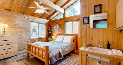 Dog-friendly rustic retreat with enclosed yard, grill, wood stove, games, & W/D