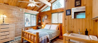 Dog-friendly rustic retreat with enclosed yard, grill, wood stove, games, & W/D