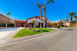 Exterior - Luxe and spacious retreat with a pool, pool spa, firepit, grill, game room, & AC (Indio)