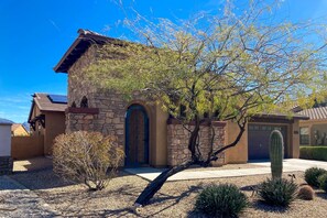 Exterior - Single-level mountain view retreat with fenced yard, washer/dryer, & AC (Goodyear)