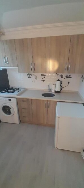 Condo, balcón, vista a la alberca | Cocina privada