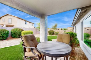 Outdoor dining - Inviting home with patio, enclosed yard, fireplace, office, streaming, W/D, AC (Goodyear)