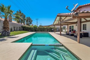 A heated pool - Dog-friendly home with pool, spa, enclosed yard, covered lanai, & fireplace (Bermuda Dunes)