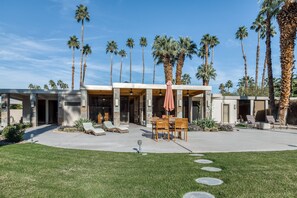 Outdoor dining - Luxurious home w/ expansive patio, shared pool, gas fireplace, mountain views (Rancho Mirage)