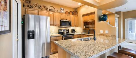 Coffee/tea maker, fridge, microwave, oven