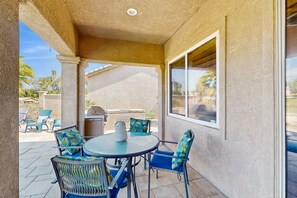 Outdoor dining - Dog-friendly golf course-adjacent home with a private pool, pool spa, & AC (Indio)