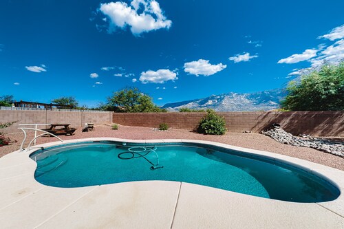 Captivating desert home with private pool, game room, grill, backyard & W/D