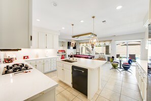 Fridge, microwave, oven, stovetop - Inviting and unique dog-friendly home with pool, pool spa, firepit, & W/D (Indio)