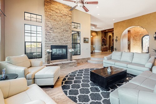 Luxury home with a pool, spa, fireplace, & private gas grill