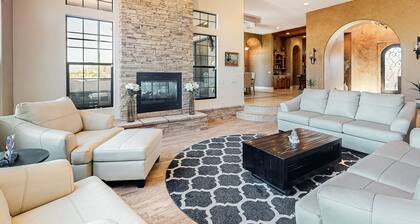 Luxury home with a pool, spa, fireplace, & private gas grill