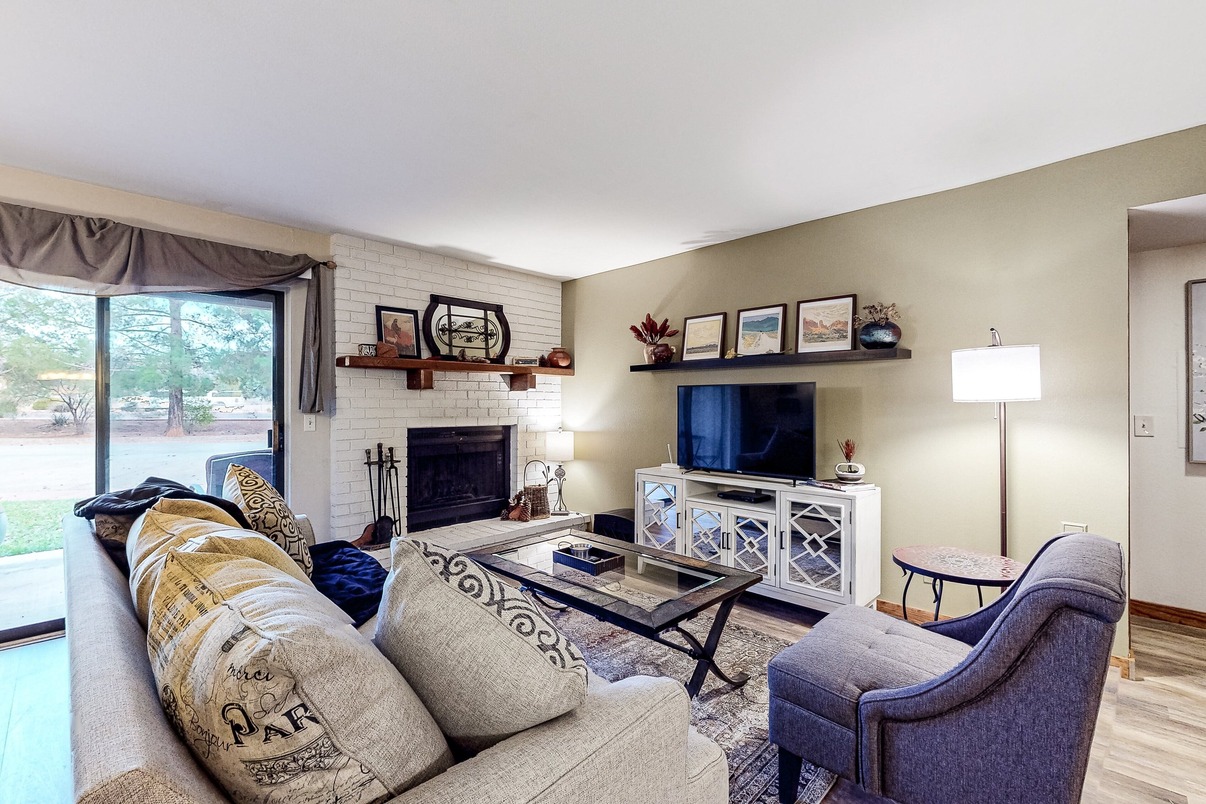 TV, fireplace, books