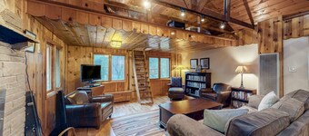 Cozy Cabin in amazing location near the creek w/ two lofts, wifi, & W/D