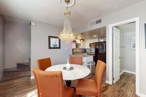 Fridge, microwave, oven, stovetop - Dog-friendly condo near attractions with fenced yard, central AC, and cute decor (Glendale)