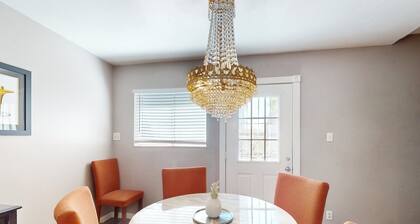 Dog-friendly condo near attractions with fenced yard, central AC, and cute decor