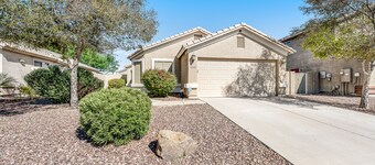 Spacious home with private heated pool with waterfall, putting green & firepit
