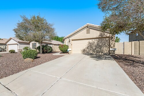 Spacious home with private heated pool with waterfall, putting green & firepit